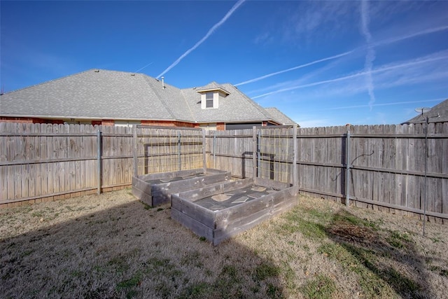 3520 SW 123rd Pl, Oklahoma City, OK 73170 - view of yard featuring a fenced backyard and a vegetable garden
