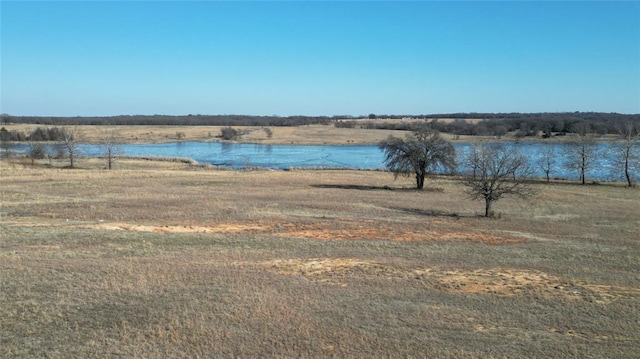 view of water feature with a rural view