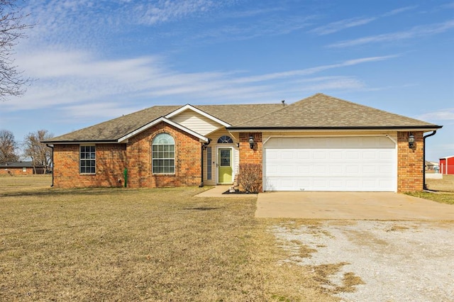 ranch-style home featuring driveway, roof with shingles, an attached garage, a front lawn, and brick siding