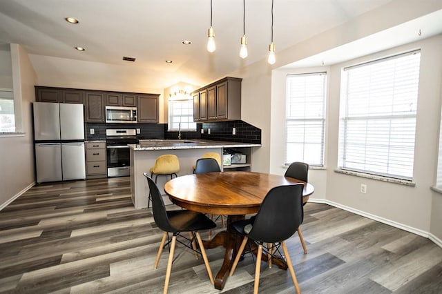 dining space featuring visible vents, baseboards, dark wood-style flooring, and recessed lighting