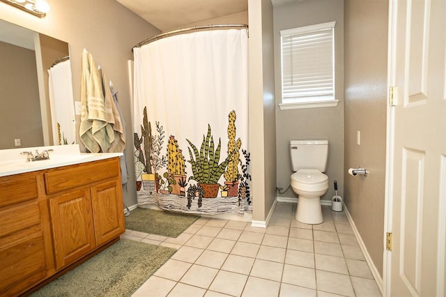 full bathroom with baseboards, toilet, curtained shower, tile patterned flooring, and vanity