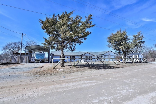 view of yard with a detached carport