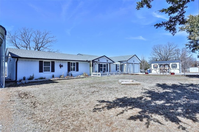 view of front of home featuring brick siding