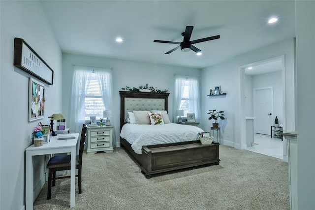 bedroom featuring carpet, multiple windows, baseboards, and recessed lighting