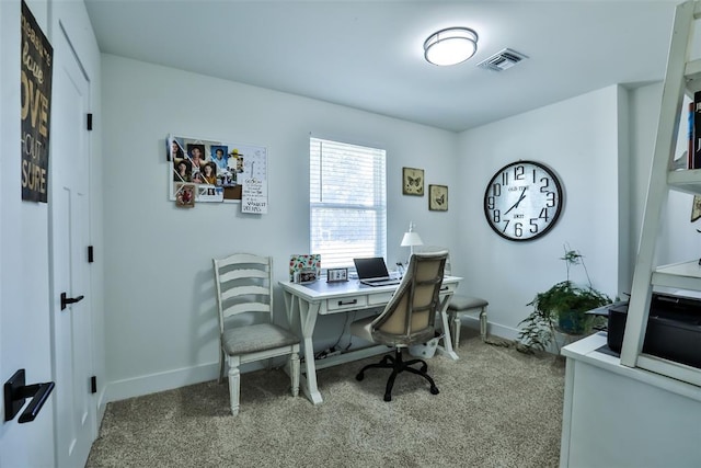 office space featuring carpet, visible vents, and baseboards