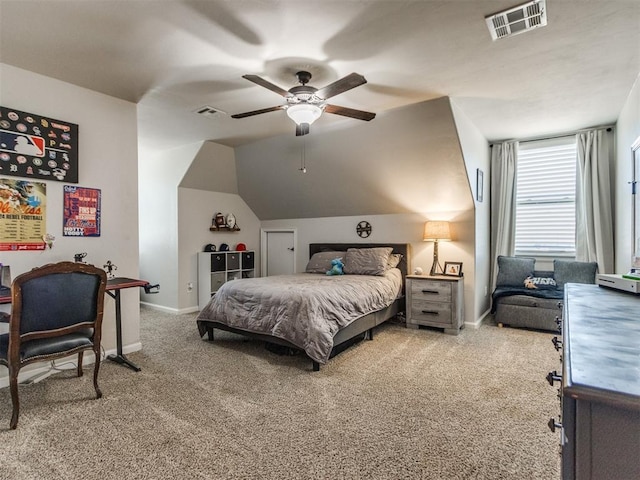 carpeted bedroom with visible vents, baseboards, ceiling fan, and lofted ceiling