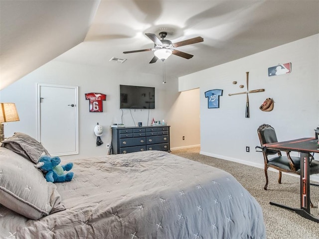 carpeted bedroom featuring visible vents, baseboards, and ceiling fan