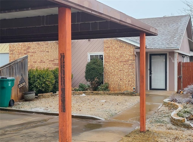 view of patio / terrace featuring fence