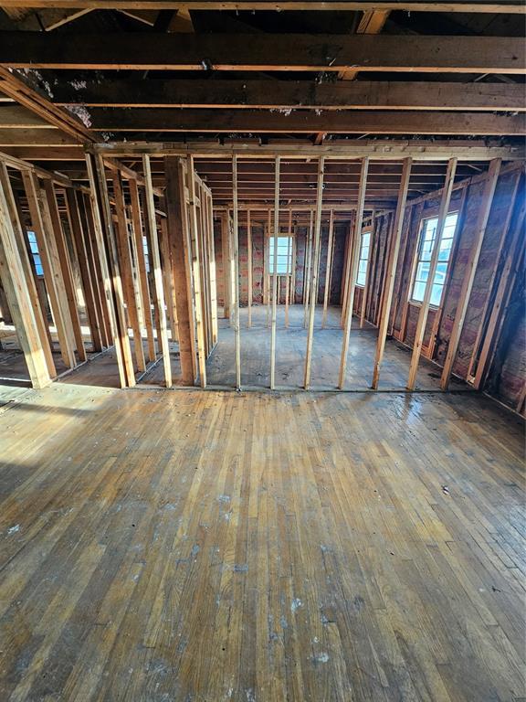 misc room with wood-type flooring