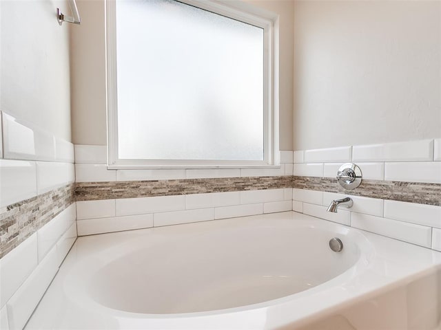 bathroom featuring a garden tub