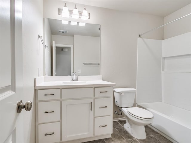 bathroom featuring toilet, bathing tub / shower combination, visible vents, and vanity