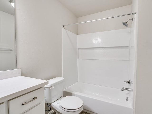 bathroom featuring toilet, shower / bath combination, and vanity