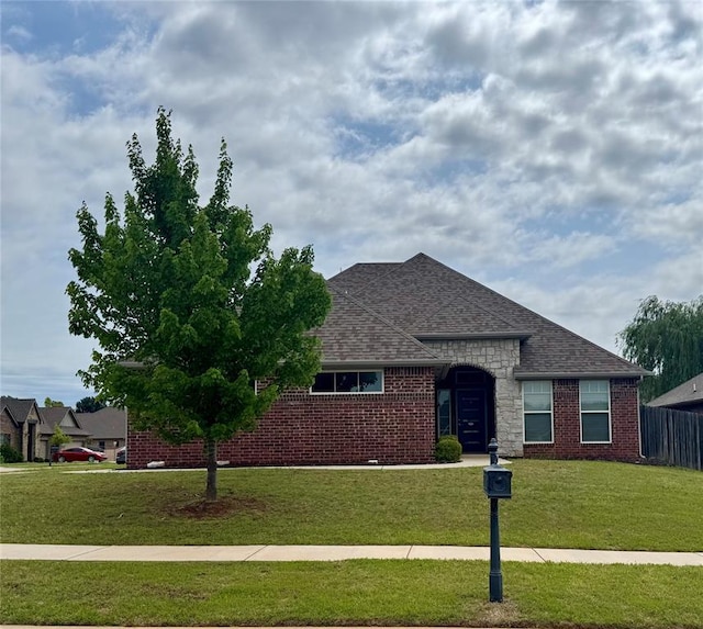 18816 Havenbrook Rd, Edmond, OK 73012 - view of front of home featuring a shingled roof and brick siding