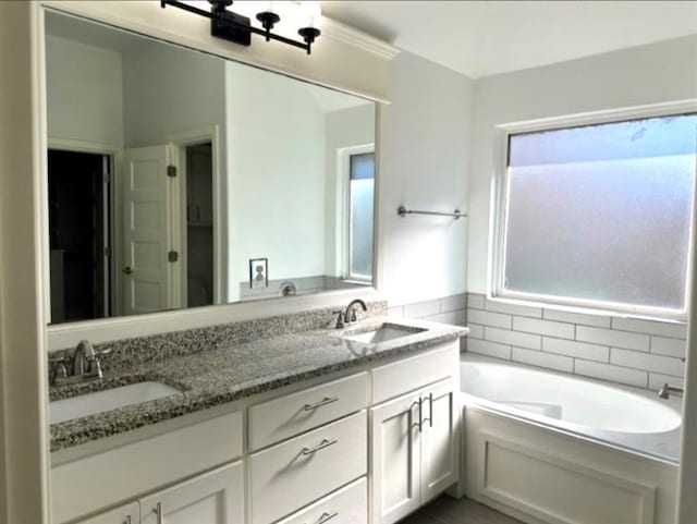 18816 Havenbrook Rd, Edmond, OK 73012 - bathroom featuring a bath and double vanity