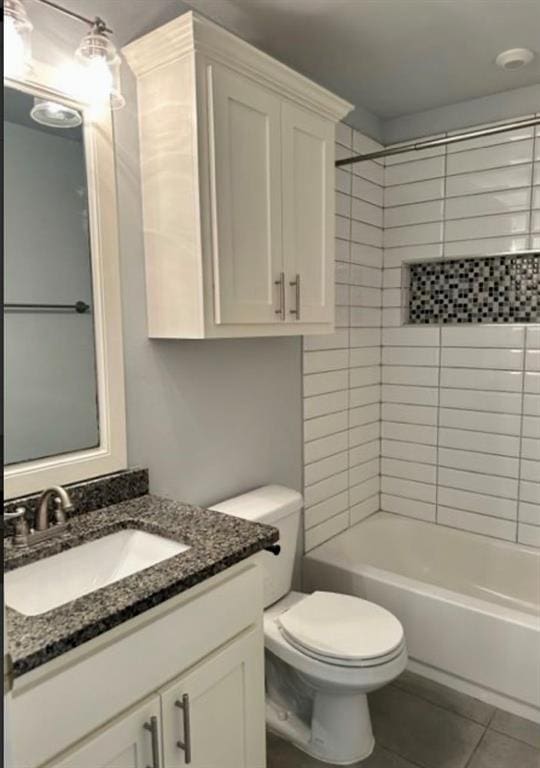 18816 Havenbrook Rd, Edmond, OK 73012 - bathroom featuring vanity, tile patterned flooring, toilet, and bathtub / shower combination