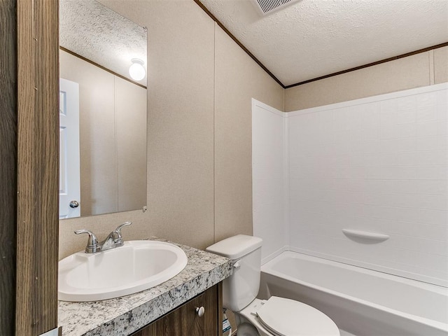 full bathroom with visible vents, toilet, a textured ceiling, shower / tub combination, and vanity