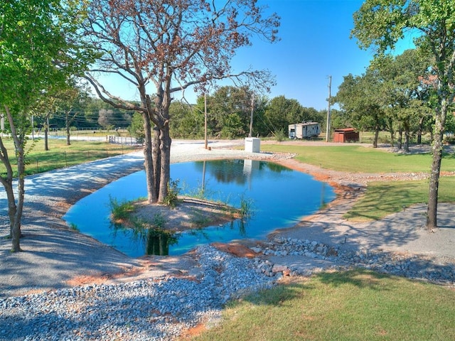 view of community featuring a lawn