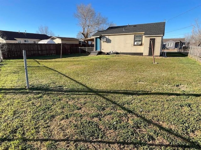 view of yard with a fenced backyard