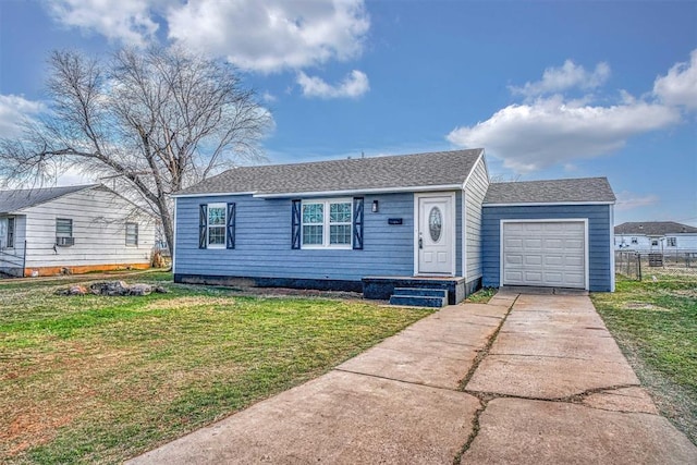 view of front of house featuring driveway, a shingled roof, an attached garage, fence, and a front lawn