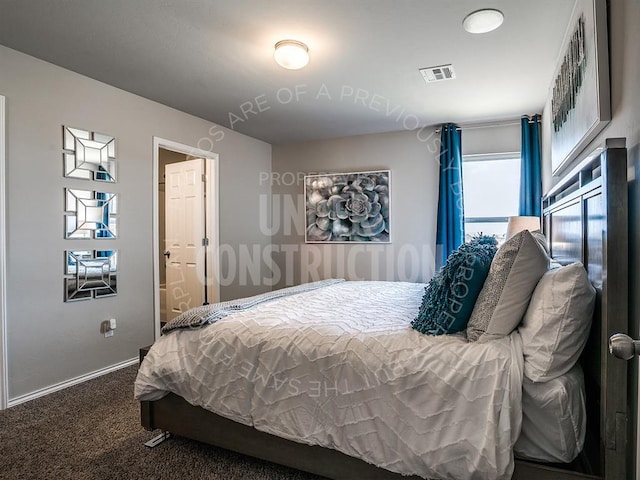 bedroom with dark colored carpet, visible vents, and baseboards