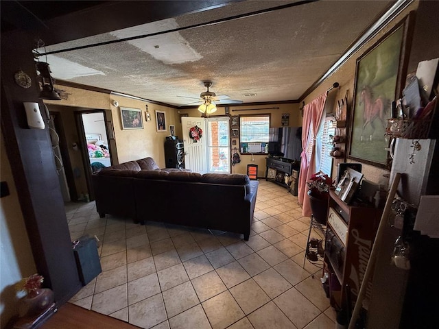 505 SE 18th St, Oklahoma City, OK 73129 - living room with ceiling fan, crown molding, a textured ceiling, and light tile patterned floors