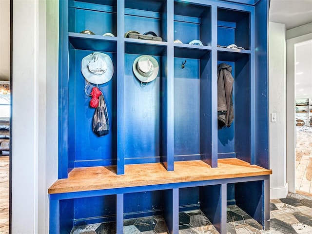 mudroom featuring stone finish flooring