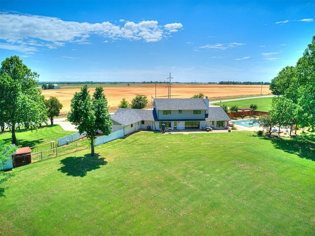 birds eye view of property featuring a rural view