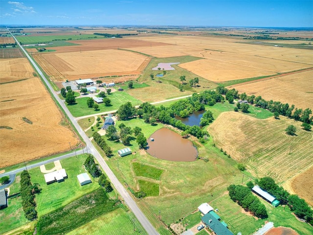 birds eye view of property featuring a rural view