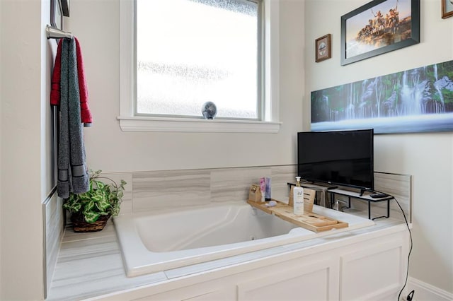 bathroom featuring a whirlpool tub