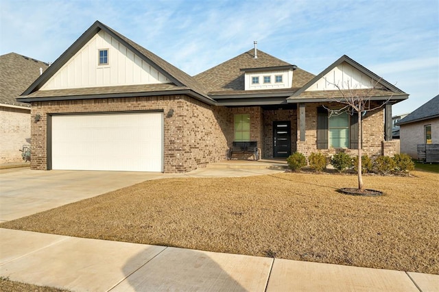 view of front facade featuring an attached garage, covered porch, concrete driveway, and brick siding