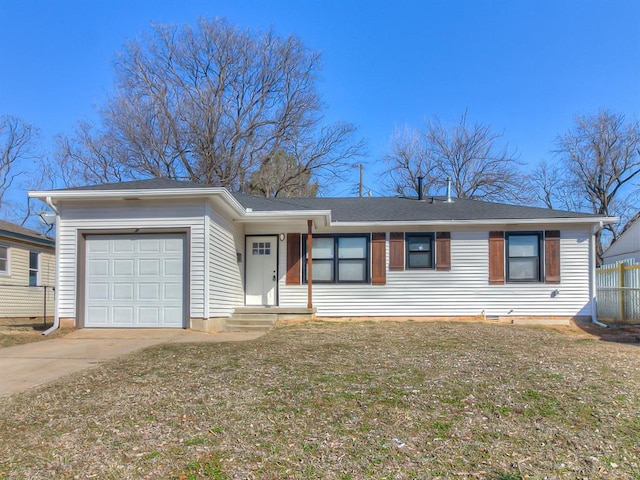 ranch-style home featuring a garage, driveway, fence, and a front yard