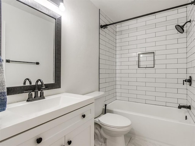 full bathroom featuring bathing tub / shower combination, vanity, and toilet