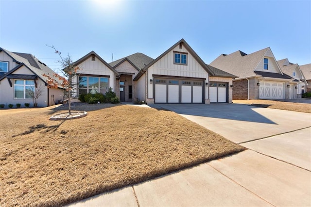 view of front of home featuring driveway, an attached garage, and board and batten siding