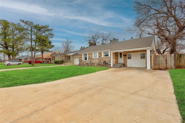 single story home featuring an attached garage, fence, driveway, a chimney, and a front yard