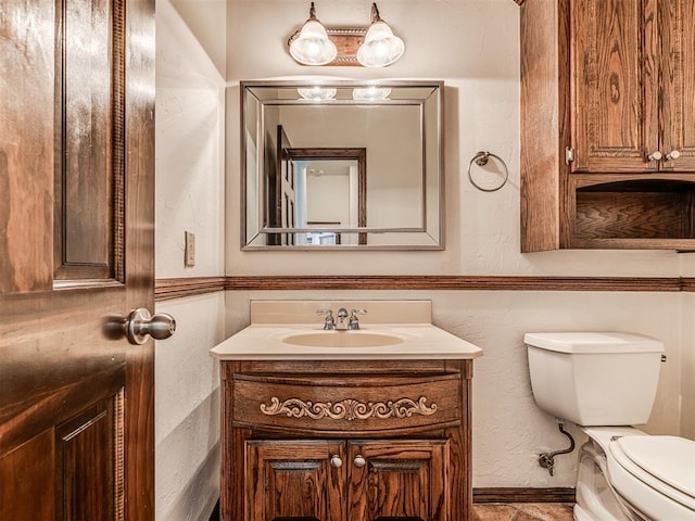 half bath with toilet and vanity