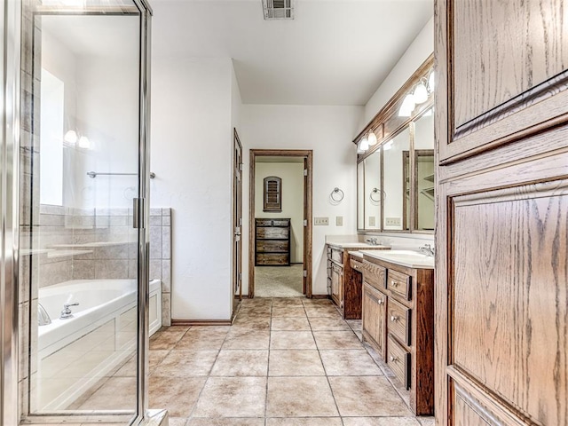 full bathroom with tile patterned flooring, visible vents, a sink, and double vanity