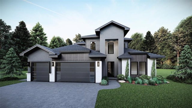 view of front of house featuring an attached garage, brick siding, driveway, roof with shingles, and a front yard