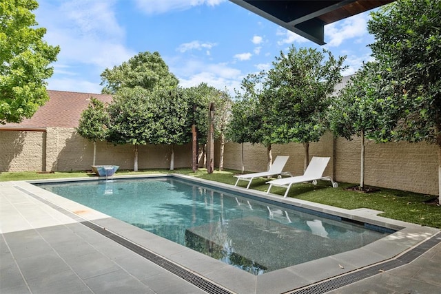 view of pool featuring a fenced backyard, a fenced in pool, and a patio