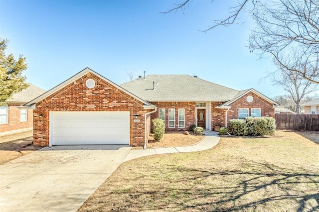 3005 Weymouth Way, Norman, OK 73071 - view of front facade featuring brick siding, a garage, driveway, and a shingled roof