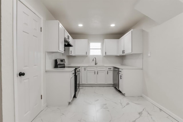 kitchen with baseboards, appliances with stainless steel finishes, marble finish floor, under cabinet range hood, and white cabinetry