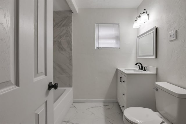 bathroom featuring marble finish floor, baseboards, vanity, and toilet