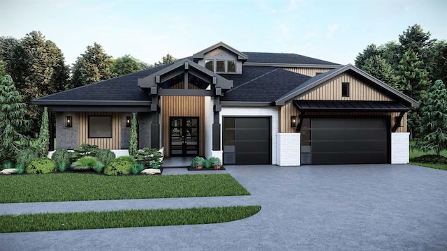 view of front of house with metal roof, a garage, driveway, french doors, and a standing seam roof