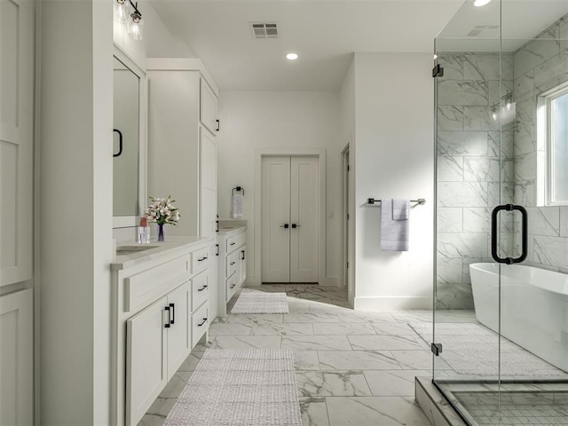 full bath featuring a marble finish shower, visible vents, marble finish floor, vanity, and recessed lighting