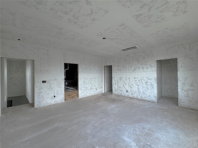 6309 NW 154th Ter, Edmond, OK 73013 - spare room featuring concrete floors