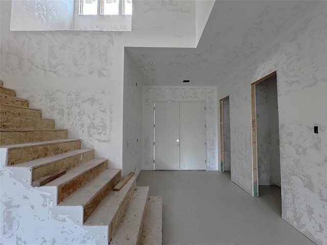 6309 NW 154th Ter, Edmond, OK 73013 - staircase with concrete flooring
