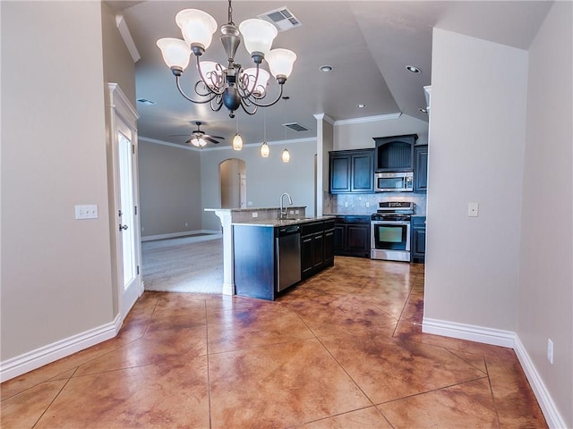 kitchen with tasteful backsplash, visible vents, arched walkways, appliances with stainless steel finishes, and a sink