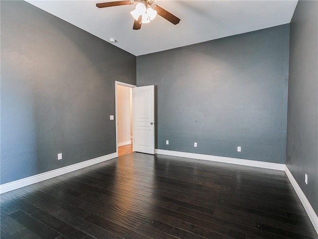 unfurnished room with a ceiling fan, baseboards, and wood finished floors