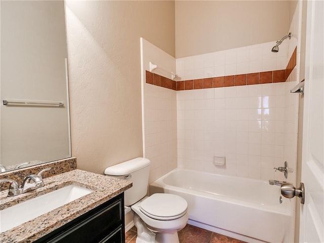 full bath featuring shower / bath combination, a textured wall, toilet, vanity, and tile patterned floors