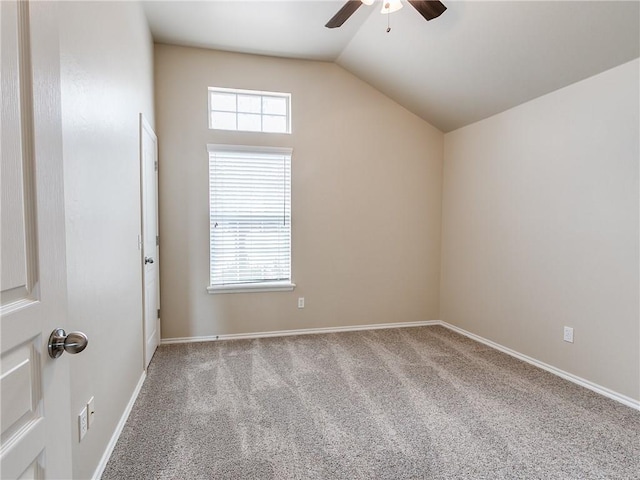 additional living space featuring lofted ceiling, carpet, plenty of natural light, and ceiling fan