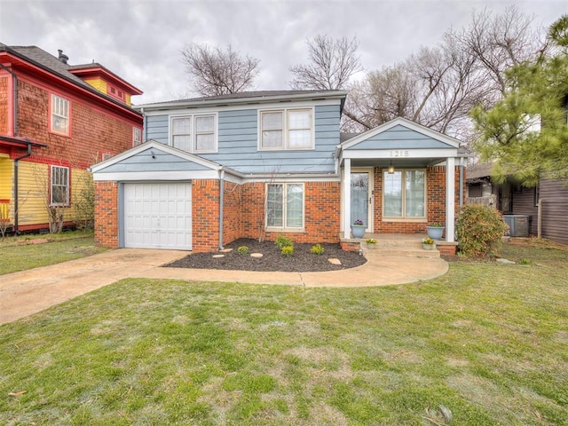 view of front of home with brick siding, a front lawn, cooling unit, a garage, and driveway